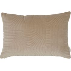 a beige pillow with an abstract design on it