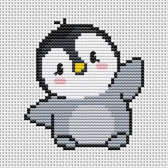 a cross stitch penguin is shown in black and white