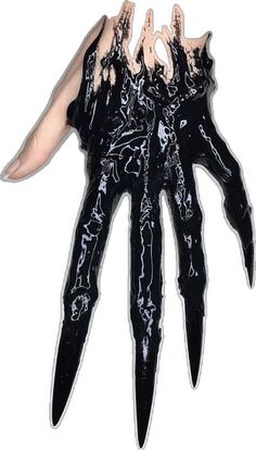 a sticker with black and white paint on it's hands, holding something in the air