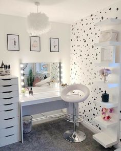 an instagram photo of a white bathroom with polka dots on the walls