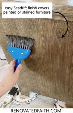 a person using a brush to clean furniture