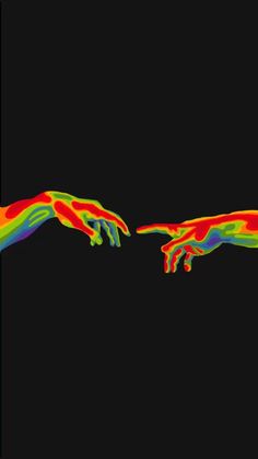 two hands touching each other with different colors