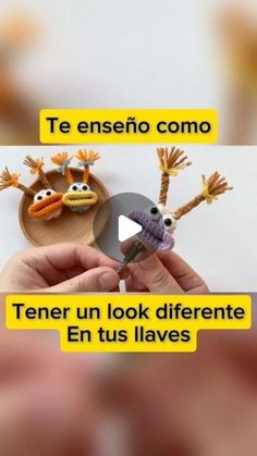 a person holding a small toy in their hand with the words tener un look different en tus laves