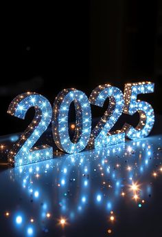 a lit up sign that reads 2055 on top of a table covered in blue and white lights