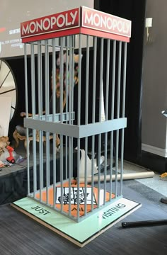 there is a model of a bird in a cage