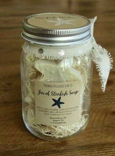 STARFISH WISHES!Our festive jar of adorable starfish soaps have arrived just in time for holiday gift giving! Each Jar of starfish soap is packaged in a 16oz mason jar, contains 5 adorable sparkling starfish soaps scented in a beachy scent. Finished off with holiday ribbon- no need for extra gift wrapping. Makes a great teacher, holiday hostess or small holiday gift for just about anyone!LISTING INCLUDES:1 16oz jar of 5 starfish soapsComplete gift in a jar!Lid can be personalized with a gift mes Jar Gifts Christmas, Diy Mason Jar Gifts Christmas, Christmas Jar Gifts, Coffee Gift Basket, Teacher Gift Baskets, Holiday Hostess Gifts, Spa Gift Basket, Gourmet Gift Baskets, Employee Appreciation Gifts