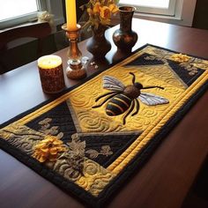 a table topped with a yellow and black place mat