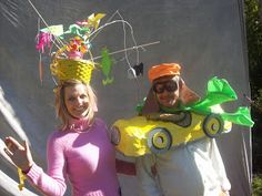 two people in costumes standing next to each other