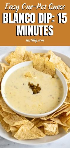 a white plate topped with chips and dip