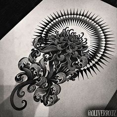 an intricate drawing on paper with black ink