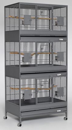 three cages are stacked on top of each other