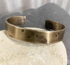 Our bronze bracelet is hand forged from rich jewelers bronze. Cuffs are hammered for texture and hand stamped with your special date inside. The cuff is oxidized in an organic solution to give it a rich, warm patina and bring out the details. Our current processing time is 5-7 business days. This is the amount of time it takes to create your piece before we ship it. if you need your order sooner we have rush processing available which you can purchase here.https://www.etsy.com/listing/813998899/ Mens Copper Bracelet, 19th Anniversary Gifts, Bronze Anniversary Gifts, 19th Anniversary, Bronze Anniversary, Porter Ranch, Bronze Bracelet, Bronze Bracelets, Copper Anniversary