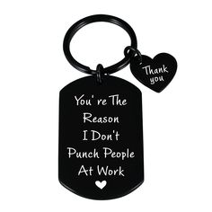 a black dog tag with the words, you're the reason i don't punch people at work