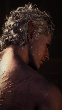 a man with grey hair and no shirt on