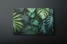 a painting of green leaves on a black background