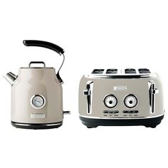 two toasters sitting next to each other on a white surface