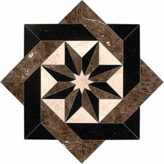 a black and white tile with a star design on the center, surrounded by smaller squares