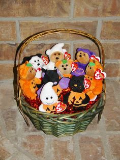 a basket filled with lots of stuffed animals