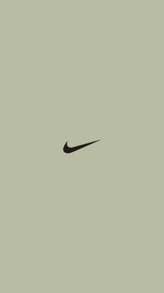 a black nike logo on a gray background