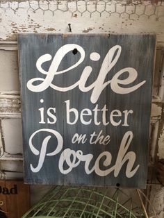 a sign that says life is better on the porch