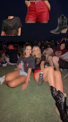 two women are sitting on the grass with their legs crossed