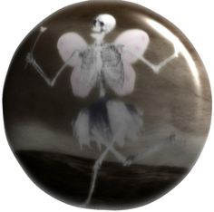 a glass ball with a skeleton holding an arrow