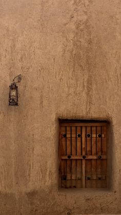 a small window on the side of a building