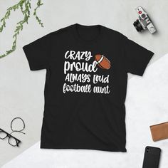 Perfect for a proud football aunt, whose nephew or niece is a football player. Cute Mother's Day gift for a football auntie, who loves to support her favorite football player on game days. * 100% ring-spun cotton * Sport Grey is 90% ring-spun cotton, 10% polyester * Dark Heather is 65% polyester, 35% cotton * 4.5 oz/yd² (153 g/m²) * Pre-shrunk * Shoulder-to-shoulder taping * Quarter-turned to avoid crease down the center * Blank product sourced from Bangladesh, Honduras, Haiti, Mexico, or Nicara High School Football Shirts, Football Aunt, Football Shirt Designs, Senior Football, Cute Mothers Day Gifts, Volleyball Humor, Auntie Shirts, Football Mom Shirts, Aunt Shirts