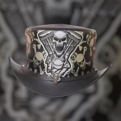 Leather Top Hat Steampunk  EI Dorado Leathe Top Hat - Steampunk Gothic Victorian Style -  Handmade Unbanded Skull Printed Leather Top Hat  *Condition: New  *Made with Geniune Leather *All Sizes Available *Totally handmade item *Unbanded Return Policy: We take pride & joy in our products and above all customer satisfaction is very important to us. Due to this we aim to respond to any customer queries and questions within 24 hours. If you have any queries about size, get in touch with us.  If for Vintage Adjustable Leather Top Hat, Adjustable Gothic Top Hat, Brown Fitted Steampunk Top Hat, Steampunk Brown Leather Top Hat, Leather Top Hat, Steampunk 4" Top Hat, Skull Print, Victorian Gothic, Top Hat