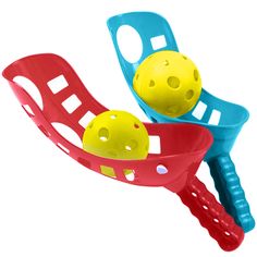 two plastic balls are in a red and blue racket on a white background with space for text