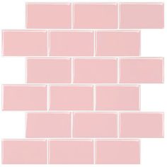 a pink brick wall with white squares on it