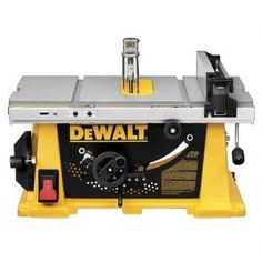 a table sawing machine with the words dewt on it's front and side