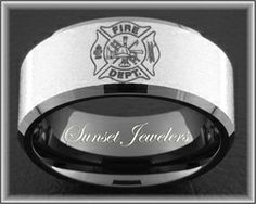 a firefighter's wedding band with an emblem on it