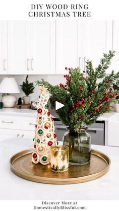 a christmas tree sitting on top of a wooden tray