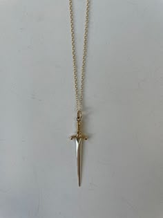 "Helen Wang Jewelry Necklace handmade with 14K Gold-Filled Links and a Sterling Silver/Bronze Sword. Sword pendant is 1.5\" in length." Gold Pendant Fantasy Necklace, Medival Necklaces, Necklace Knives, Dager Necklace, Dagger Necklace, Accessories Cute, Sterling Silver Jewelry Handmade, Jewelry Style, Charm Necklaces