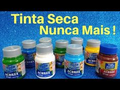 there are many bottles of paint next to each other with the words tinta seca nunca mais