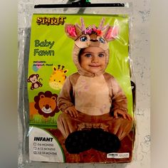 a baby in a costume sitting on top of a package with the words infant fawn printed on it