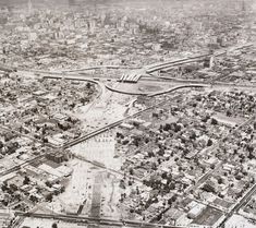 an aerial view of a city in the 1950's