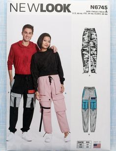 a man and woman standing next to each other wearing new look pants