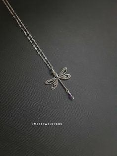 Sweet detailed dragonfly necklace with dangling amethyst bead. Silver plated brass dragonfly measures 24x24mm. Dragonfly is on an 18'' stainless steel chain with lobster clasp. *Silver plated brass dragonfly  *Faceted amethyst bead *Stainless steel chain *Handmade with love <3 Like Jmesjewelrybox on Facebook for updates on new jewelry, upcoming sales and giveaways! Plus Facebook fans save 5% :D Find the coupon code on Jmesjewelrybox's cover photo https://www.facebook.com/Jmesjewelrybox Insect Necklace, Silver Dragonfly Necklace, Dragonfly Jewelry, Dragonfly Necklace, Insect Jewelry, Toggle Necklace, Dragonfly Pendant, Amethyst Beads, Jewelry Inspo