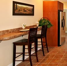 the kitchen is clean and ready to be used as a dining room or living room