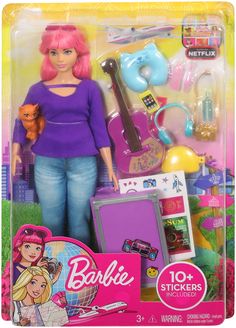 the barbie doll is holding her toy guitar and other items in its package for sale