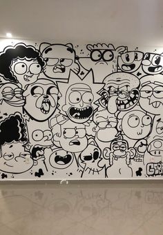 a wall with many cartoon characters painted on it in an office building or waiting area