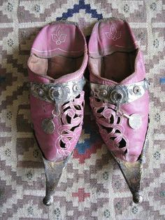 From Chapter One: "If Habibi can’t keep her pretty, silly shoes under her ample bottom—that’s my problem how?"   Traditional Morocco slippers  - Marrakech Style, Moroccan Slippers, Fairy Shoes, Moroccan Design, Arabian Nights, Only Shoes, Traditional Fashion, Moroccan Style, Pink Shoes