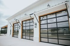 an empty store front with glass doors and windows