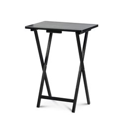 a small black table sitting on top of a white floor