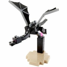 a lego model of a black bird with pink beaks on it's wings