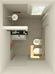 an overhead view of a small bathroom with toilet and sink