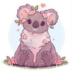 a koala with flowers on its head sitting in the grass