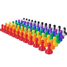 the colorful plastic chess pieces are lined up